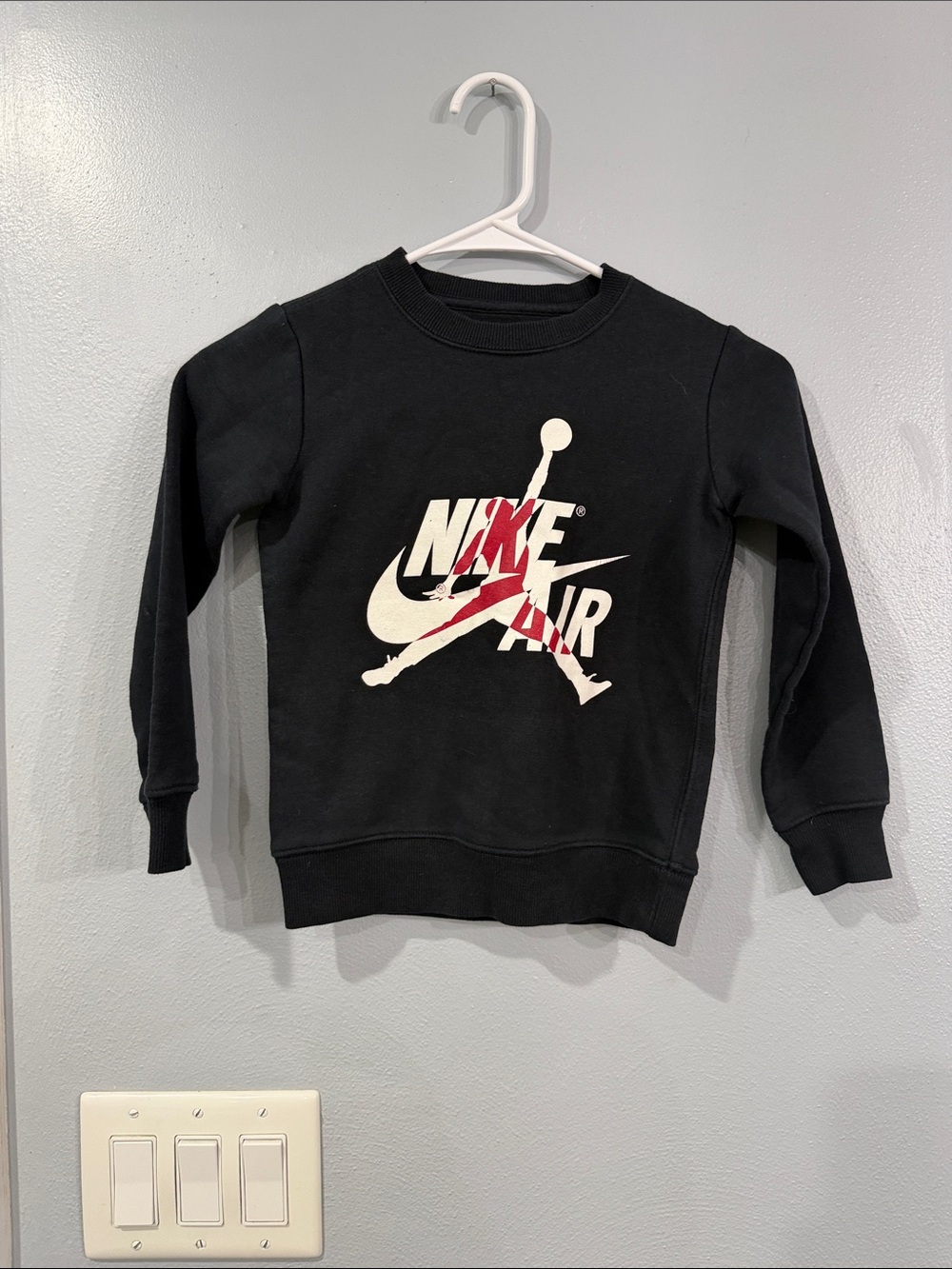 Nike Kids Black Crew Sweatshirt with White and Red Nike Air Graphic